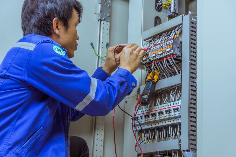 Electrician Repairing Panel
